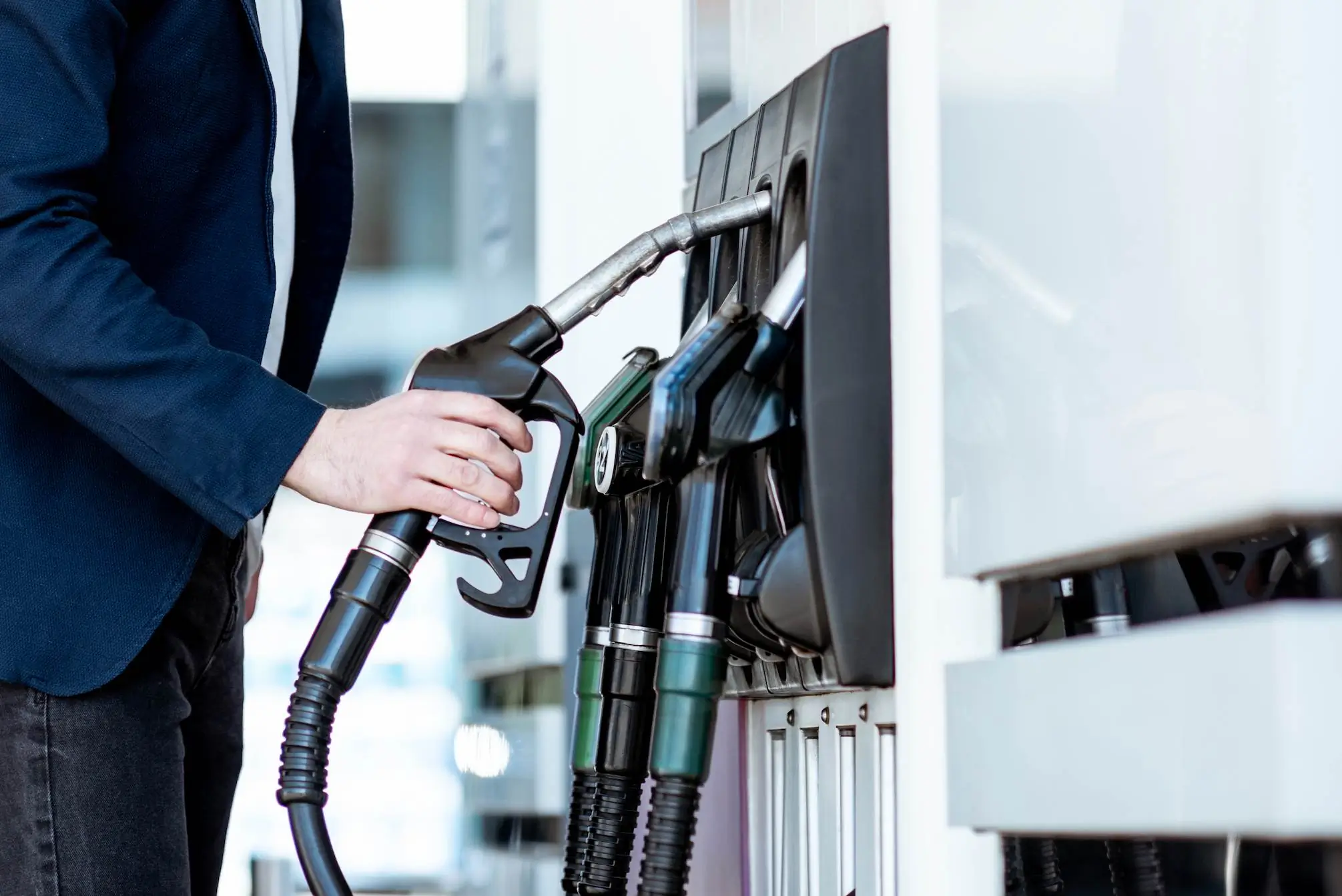 Person at a gas pump